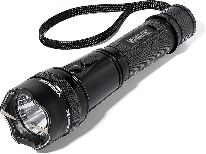 The 4485 Heavy Duty Aluminum Stun Gun for Self Defense is rechargeable, features an LED flashlight, wrist strap, textured grip, button switch, and a jagged bezel for protection. "4485" branding appears on the side and front.